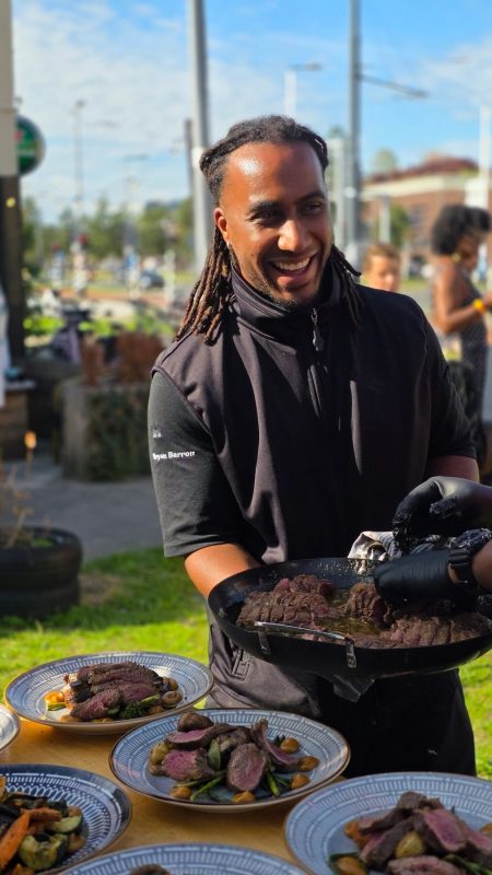 Chef Bryan serving his dish