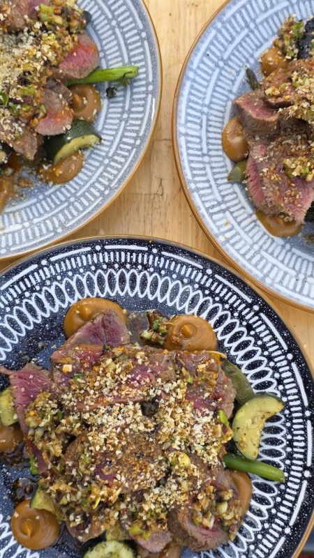 Plates of grilled dishes from above