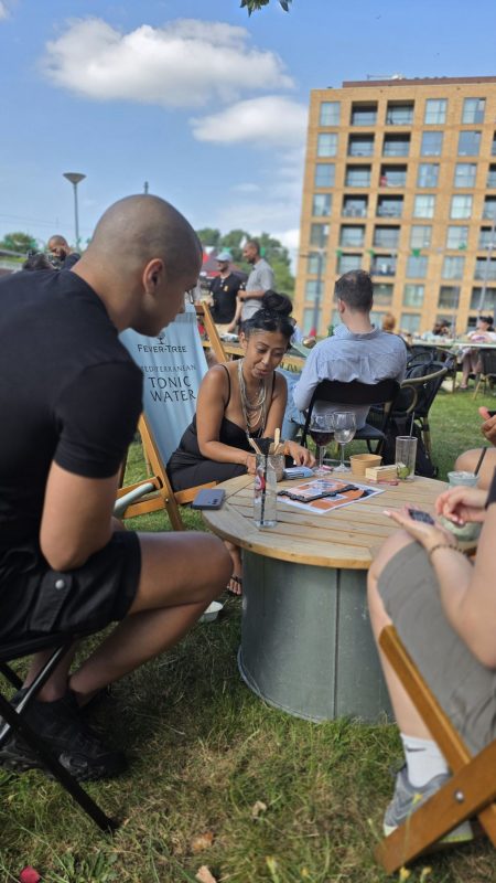 Guests playing a game around a table
